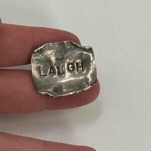 Vintage handmade sterling silver Laugh brooch